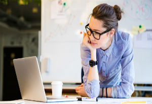 A woman working on her laptop