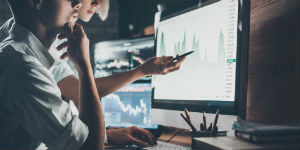 young business team analysing data