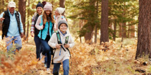 multi generation family out walking