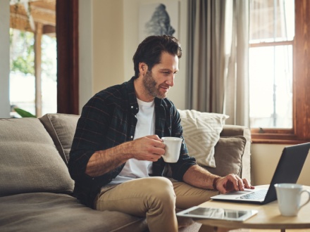 Man at home working remotely