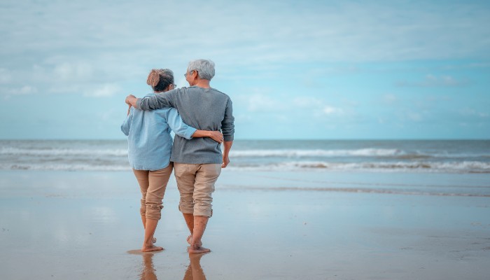 senior couple on beach