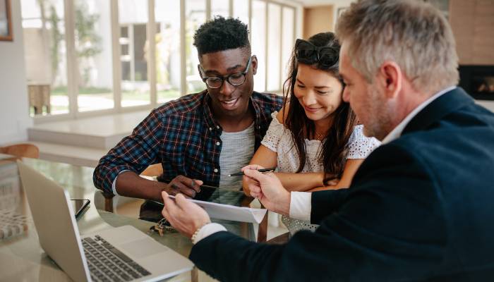 couple getting advice from financial advisor