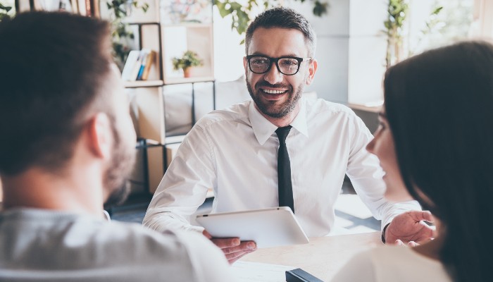 financial advisor with couple 