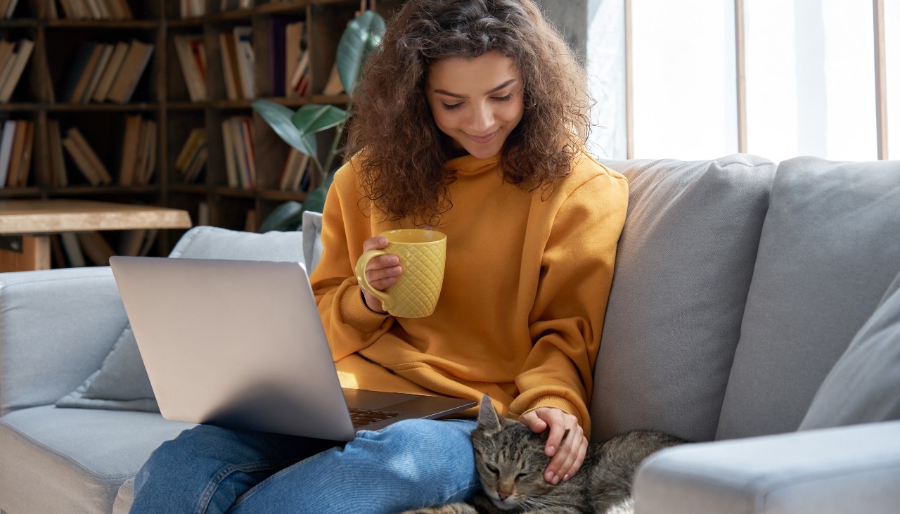 woman at home with cat