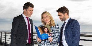 zurich employees reading brochure