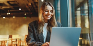 smiling business woman at laptop