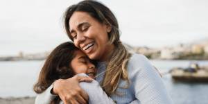 mother and daughter hugging