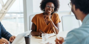 female hosting meeting in office