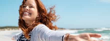 smiling woman on the beach