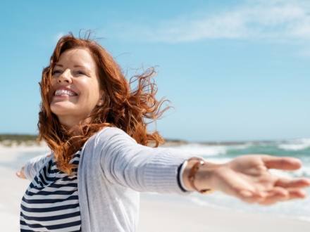smiling woman on the beach