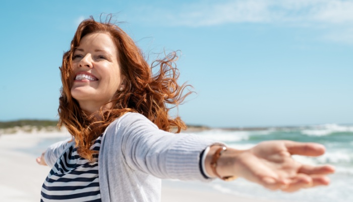 smiling woman on the beach