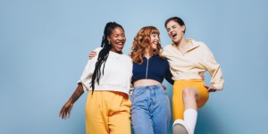 Group of three happy female friends