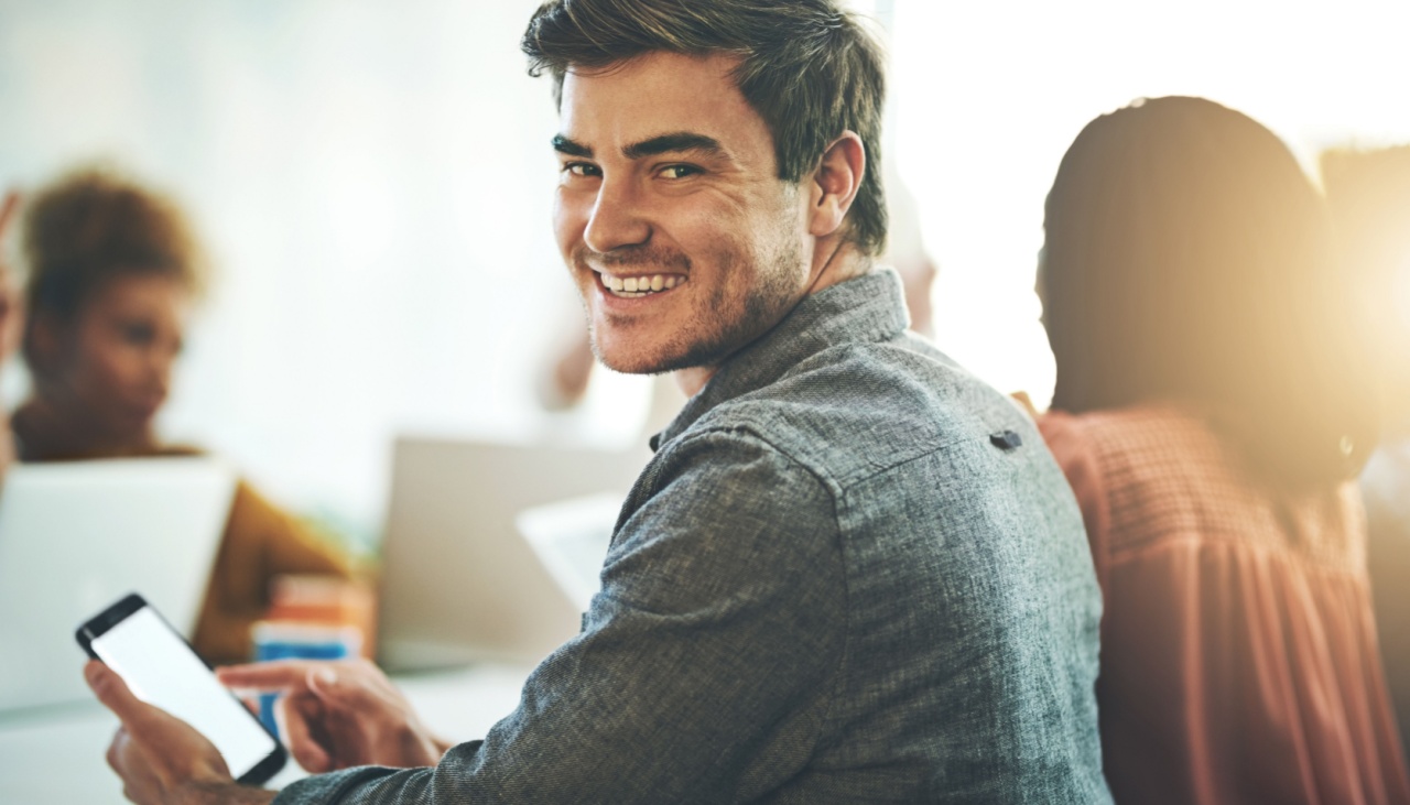 young business man in office on phone