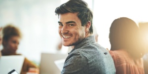 young business man in office on phone