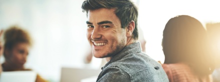 young business man in office on phone