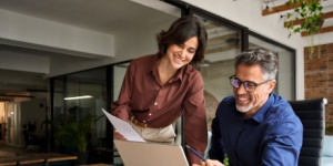 Happy busy executive people working together in office