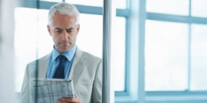 business man reading a newspaper
