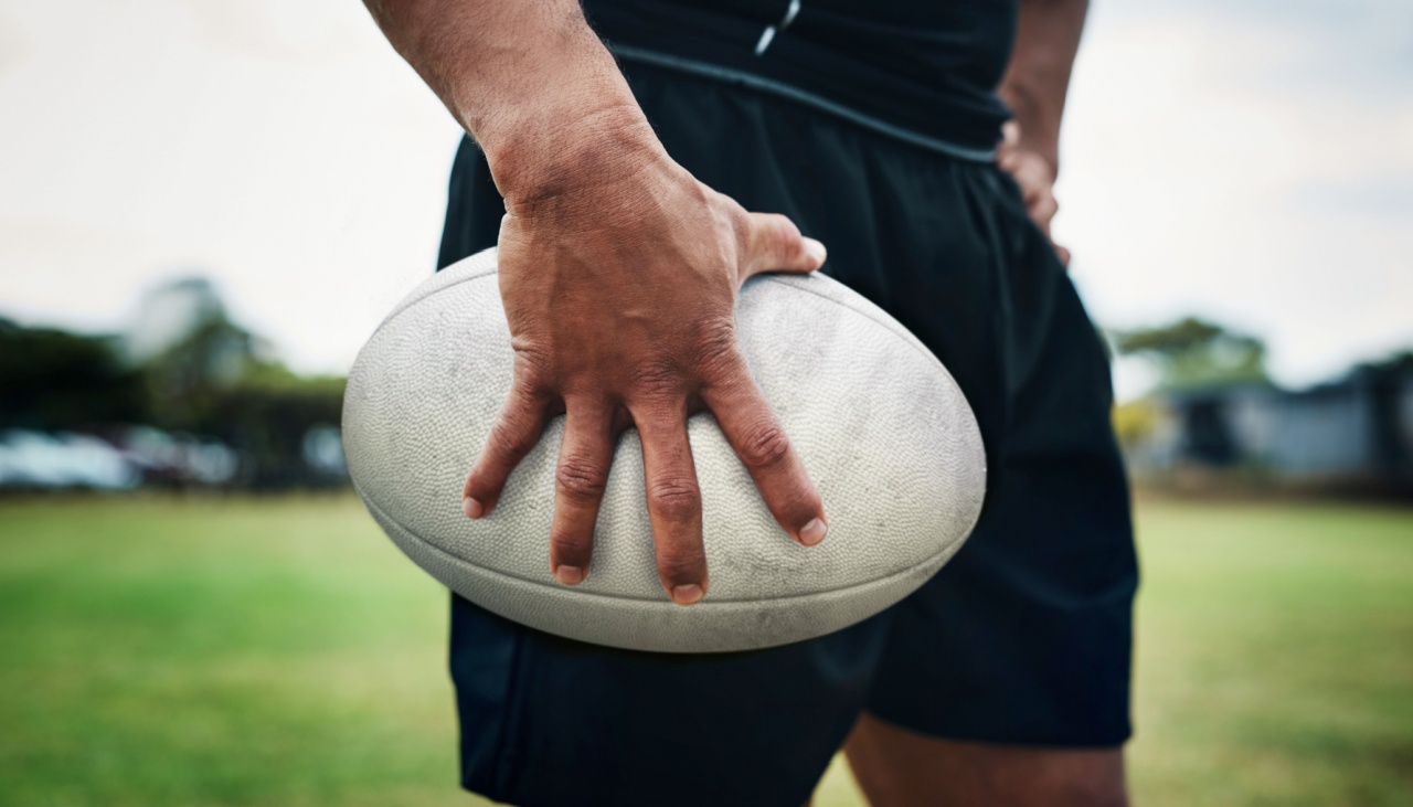 rugby player holding a rugby ball