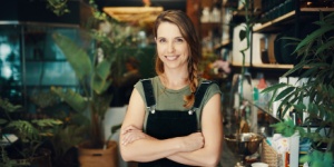 Smiling florist in her flower shop