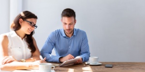 two work colleagues having coffee together